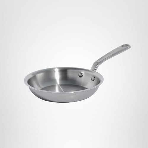Stainless steel frying pan on a white background