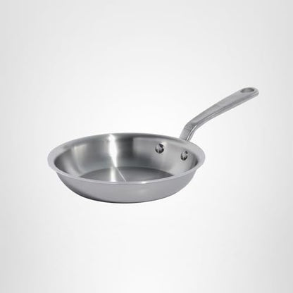 Stainless steel frying pan on a white background