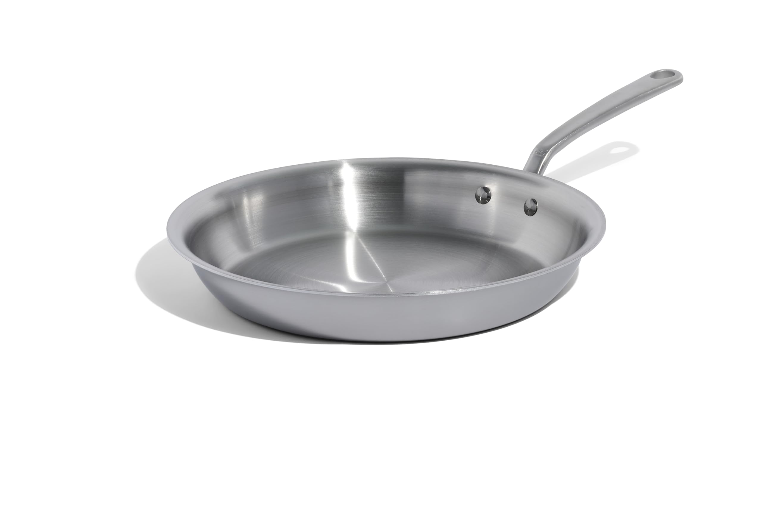 Stainless steel frying pan on a white background