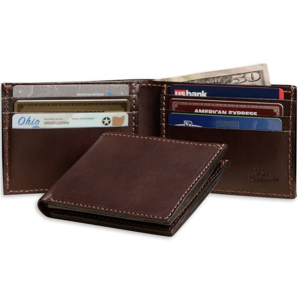 Brown leather wallet with cards and money on a white background