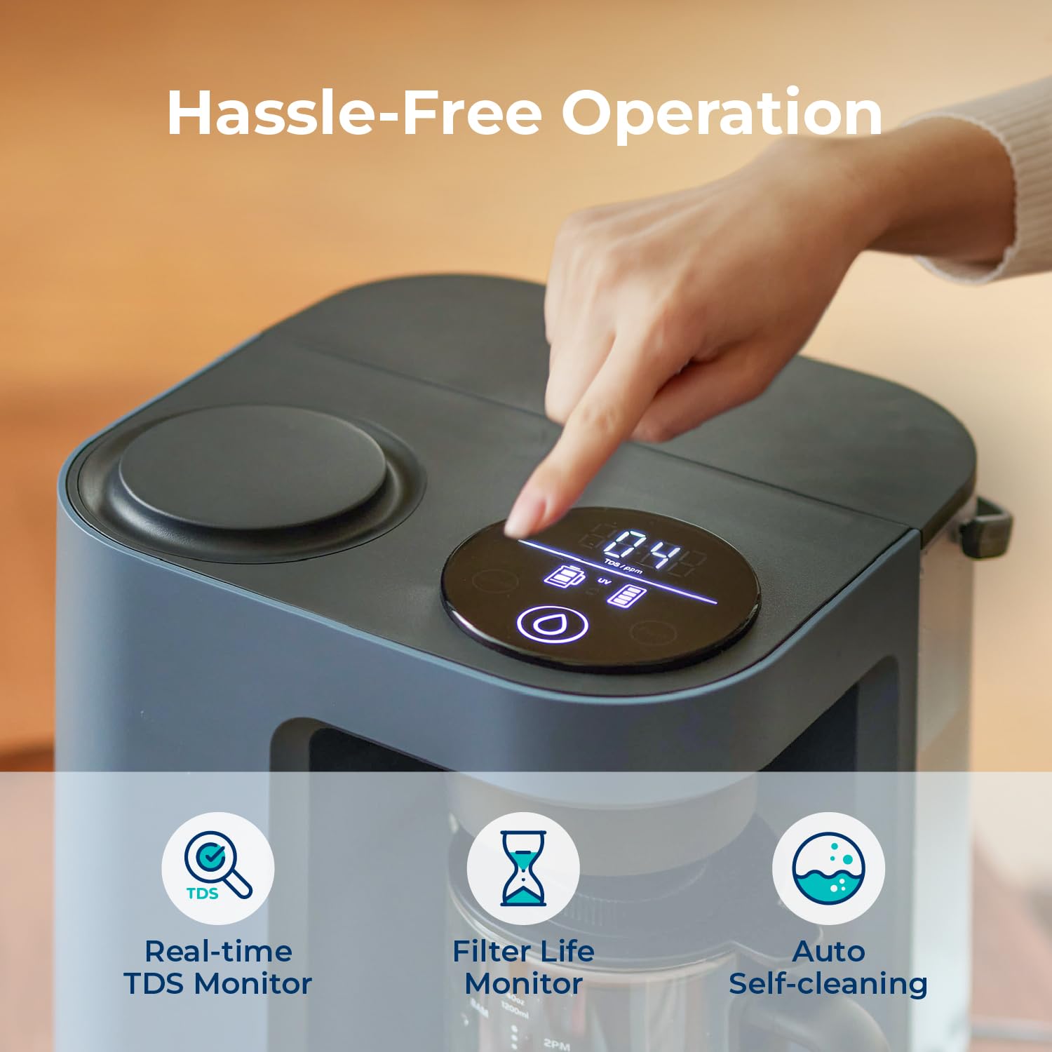 Person interacting with a water filter device, highlighting features like TDS monitor, filter life monitor, and auto self-cleaning.