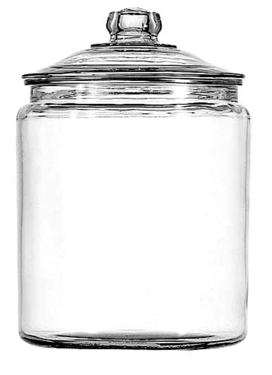 Clear glass jar with a lid on a white background