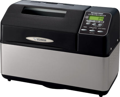 Zojirushi bread maker with digital display on a white background