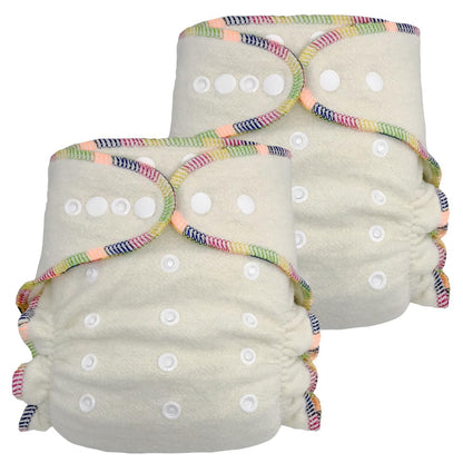 Two cloth diapers with colorful elastic bands on a white background