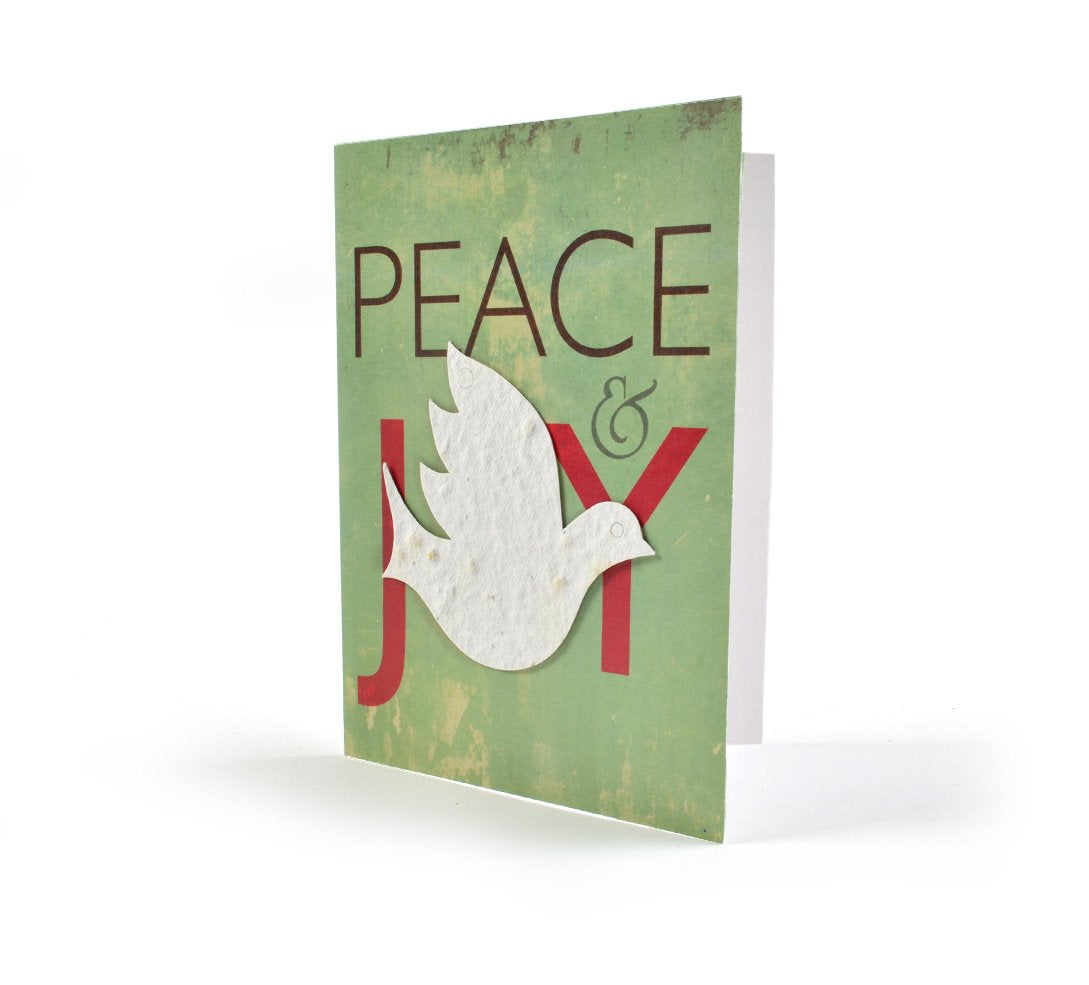 Greeting card with 'Peace & Joy' text and a dove on a green background