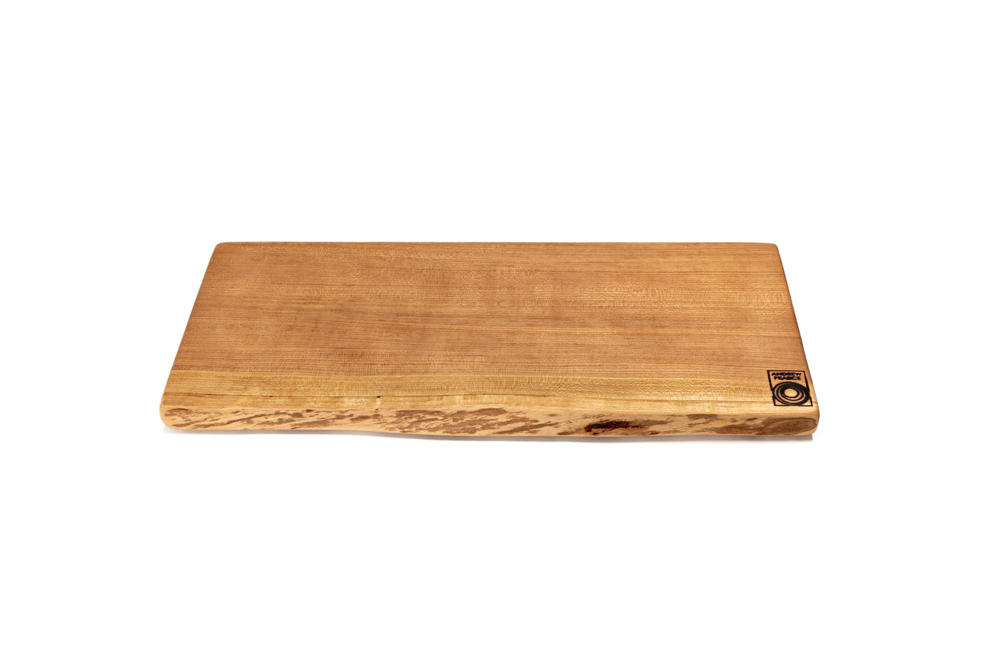 Wooden cutting board with a natural finish on a white background