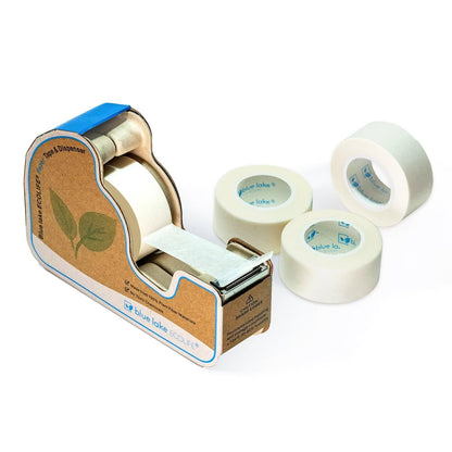 Tape dispenser with multiple rolls of tape on a white background