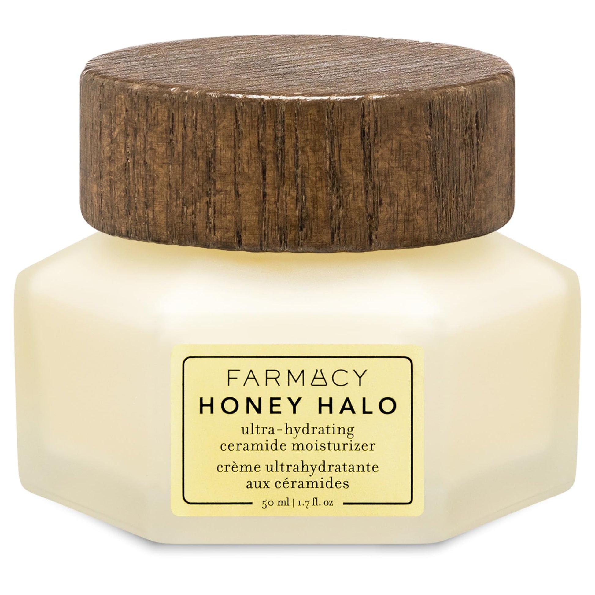 Farmacy Honey Halo moisturizer jar with wooden cap on a white background