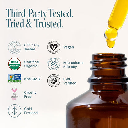 Brown glass bottle with dropper and certification logos on a white background