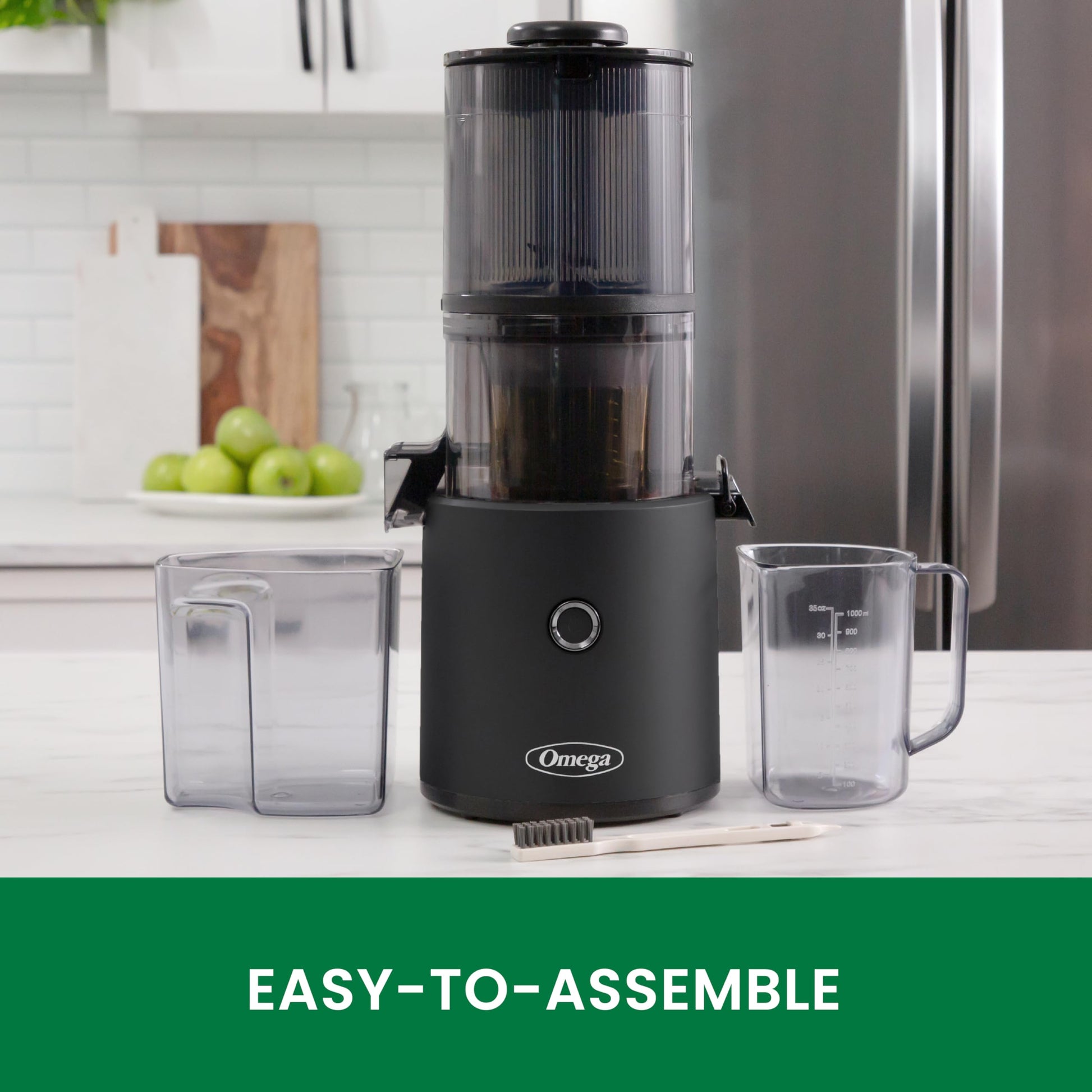 Black Omega juicer with accessories on a kitchen counter, labeled 'Easy-to-Assemble'.
