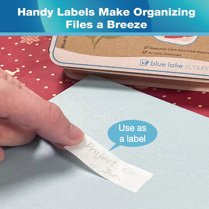 Hand applying a label to a file with text 'Handy Labels Make Organizing Files a Breeze' at the top.