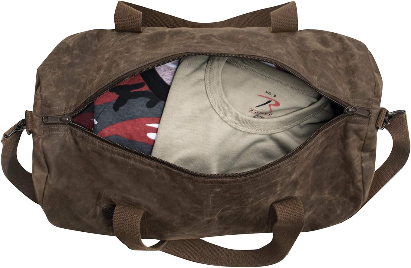 Brown duffel bag with shirts inside on a white background