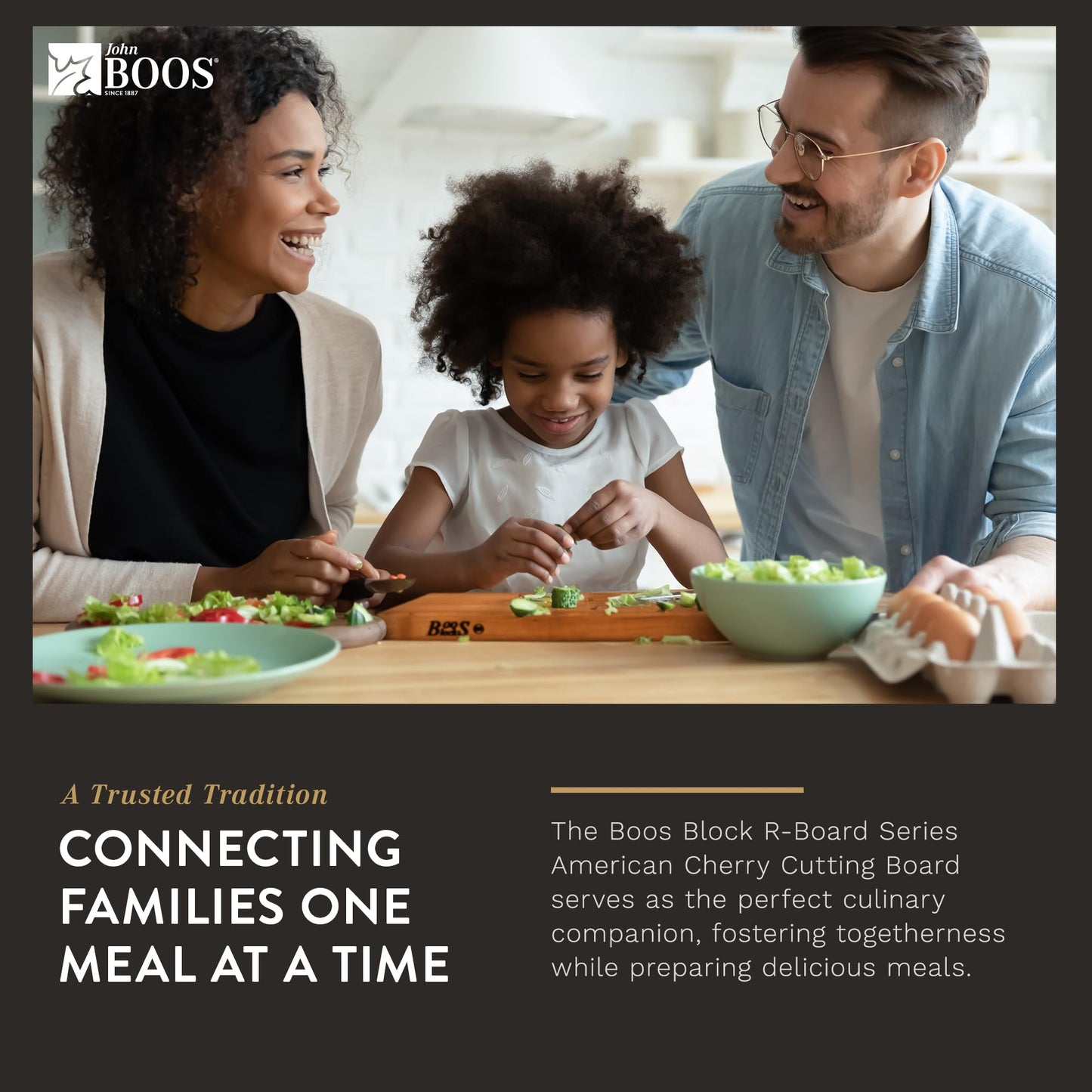 Family of three at a dining table with a Boos Block R-Board Series cutting board.
