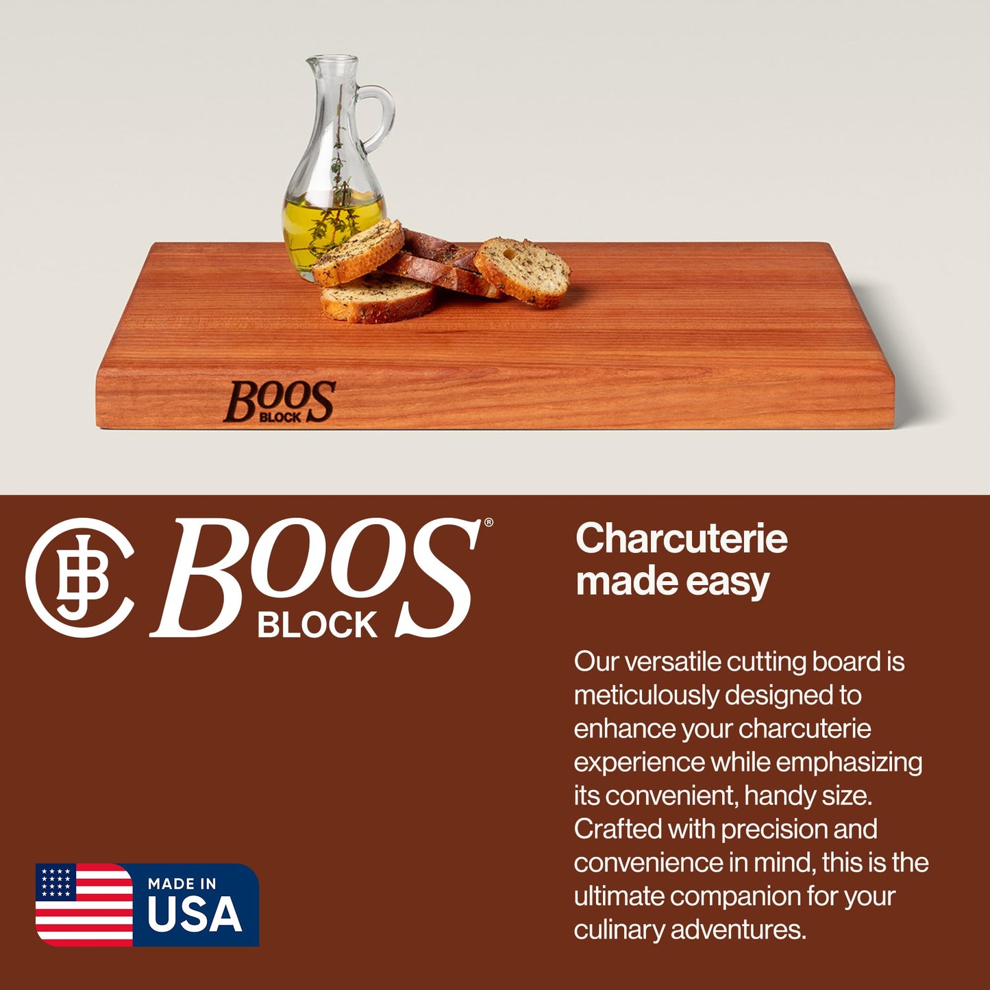 Wooden cutting board with bread and olive oil, Boos Block branding, on a beige background.