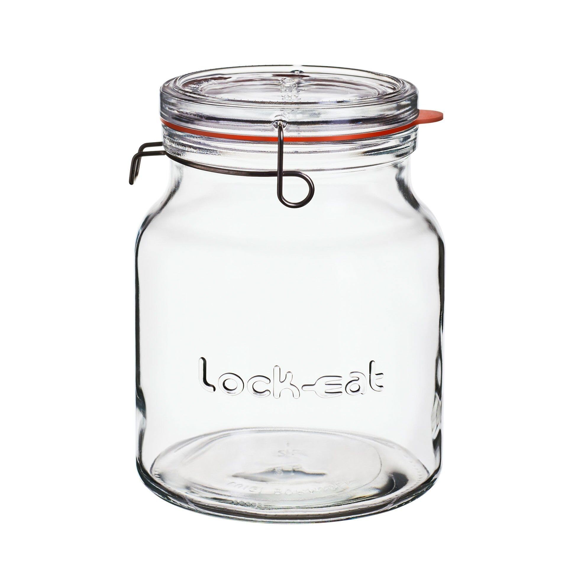 Clear glass jar with a clamp lid on a white background