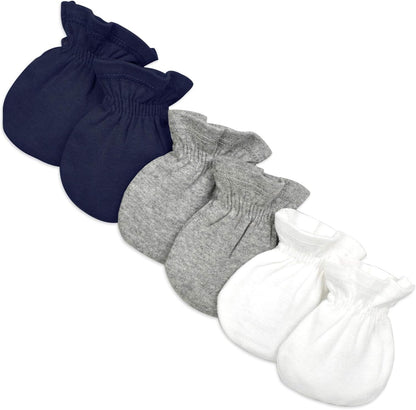 Set of three pairs of socks in navy, gray, and white on a white background