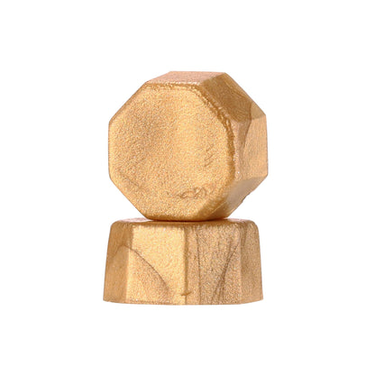 Two brass hexagonal sealing wax on a white background