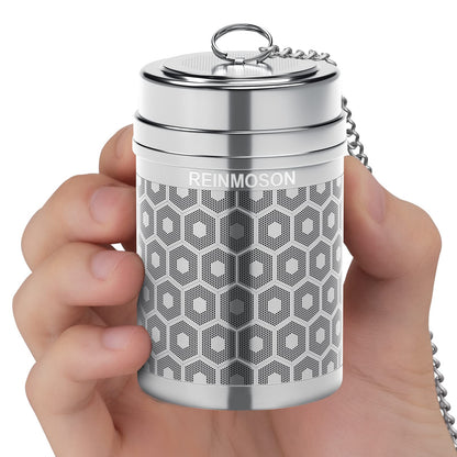 Hand holding a stainless steel Reinmoson Tea Strainer on a white background