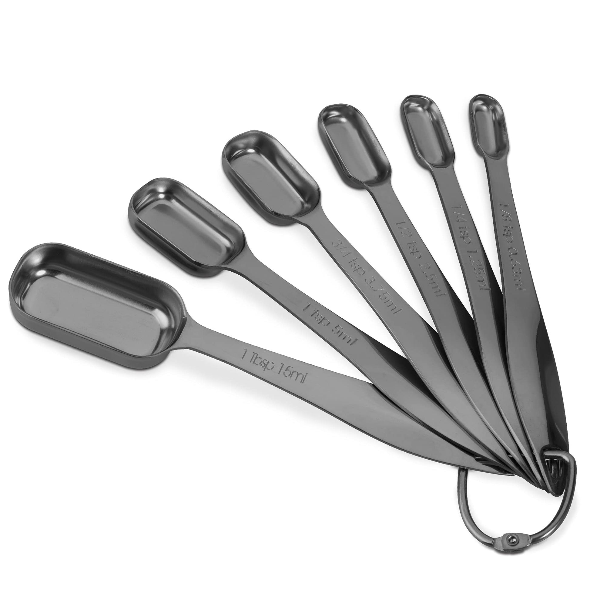 Set of six stainless steel measuring spoons on a white background