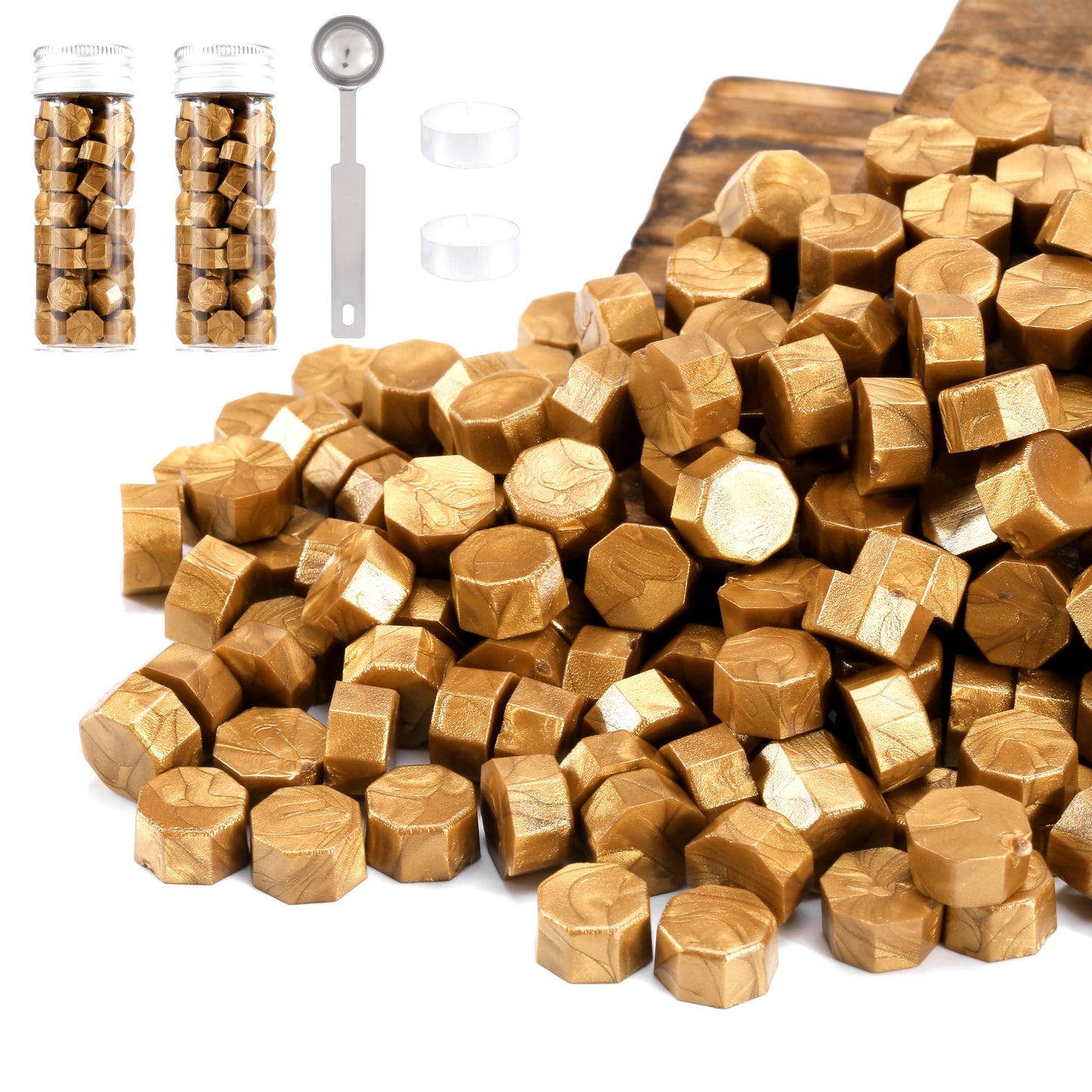 Gold hexagonal sealing wax with packaging, measuring tool, and wooden board on a white background