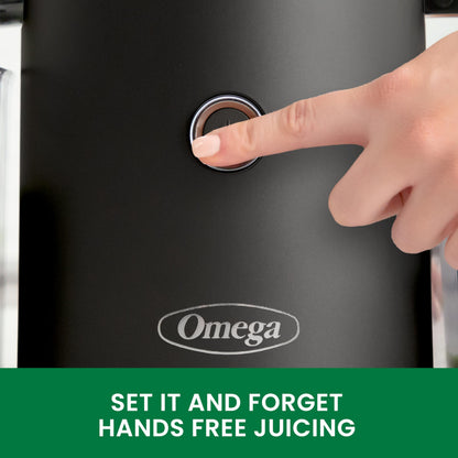 Hand pressing a button on a black Omega juicer with text 'Set it and forget hands free juicing'.