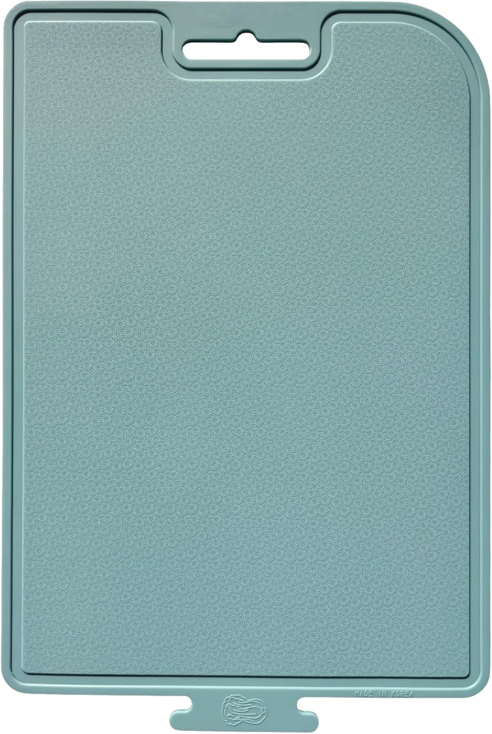 Teal silicon cutting board with a textured surface on a white background