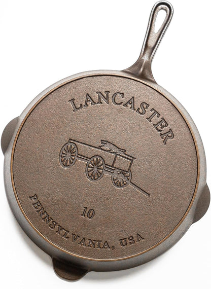 Cast iron skillet with 'Lancaster, Pennsylvania, USA' engraving on a white background