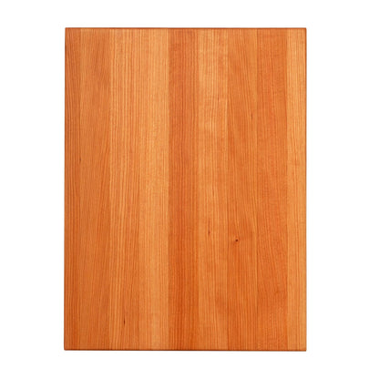 Wooden cutting board with a light brown finish on a white background