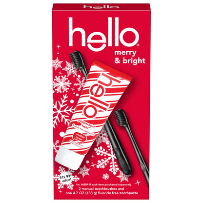 Red 'hello' holiday gift set packaging with toothbrushes and toothpaste on a white background
