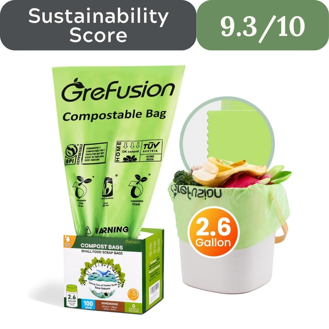 Grefusion compostable bag with packaging and a small container filled with food scraps on a white background.
