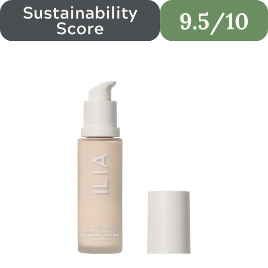 ILIA foundation bottle with cap on a white background, featuring a sustainability score of 9.5/10.
