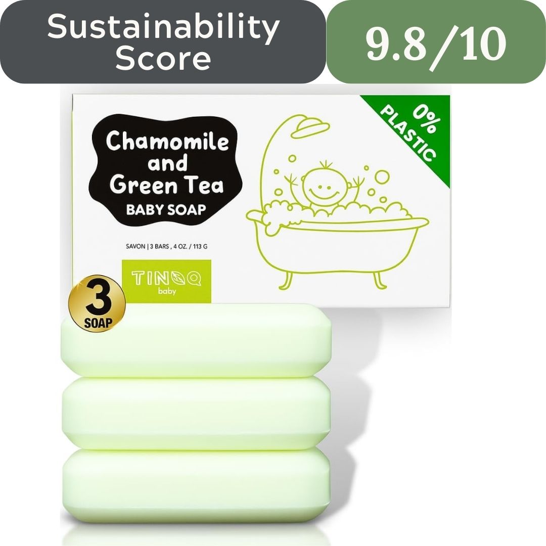 Three bars of chamomile and green tea baby soap with packaging displaying sustainability information.